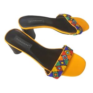 Bonnibel size 8 yellow bead work slip on oval 3 inch heel sandals